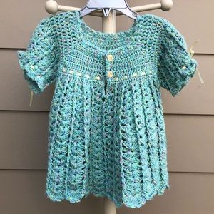 Hand-crocheted pullover sweater.